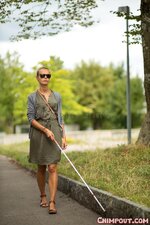 blind-woman-walking-city-streets-using-her-white-cane-to-navigate-urban-space-better-get-desti...jpg