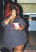 000946-fat-overweight-black-woman-with-huge-red-hair-eating-kfc-chicken.jpg
